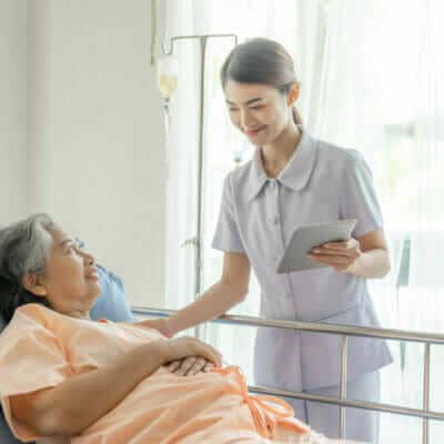 nurses are well good taken care elderly patients hospital bed patients feel happiness medical healthcare concept